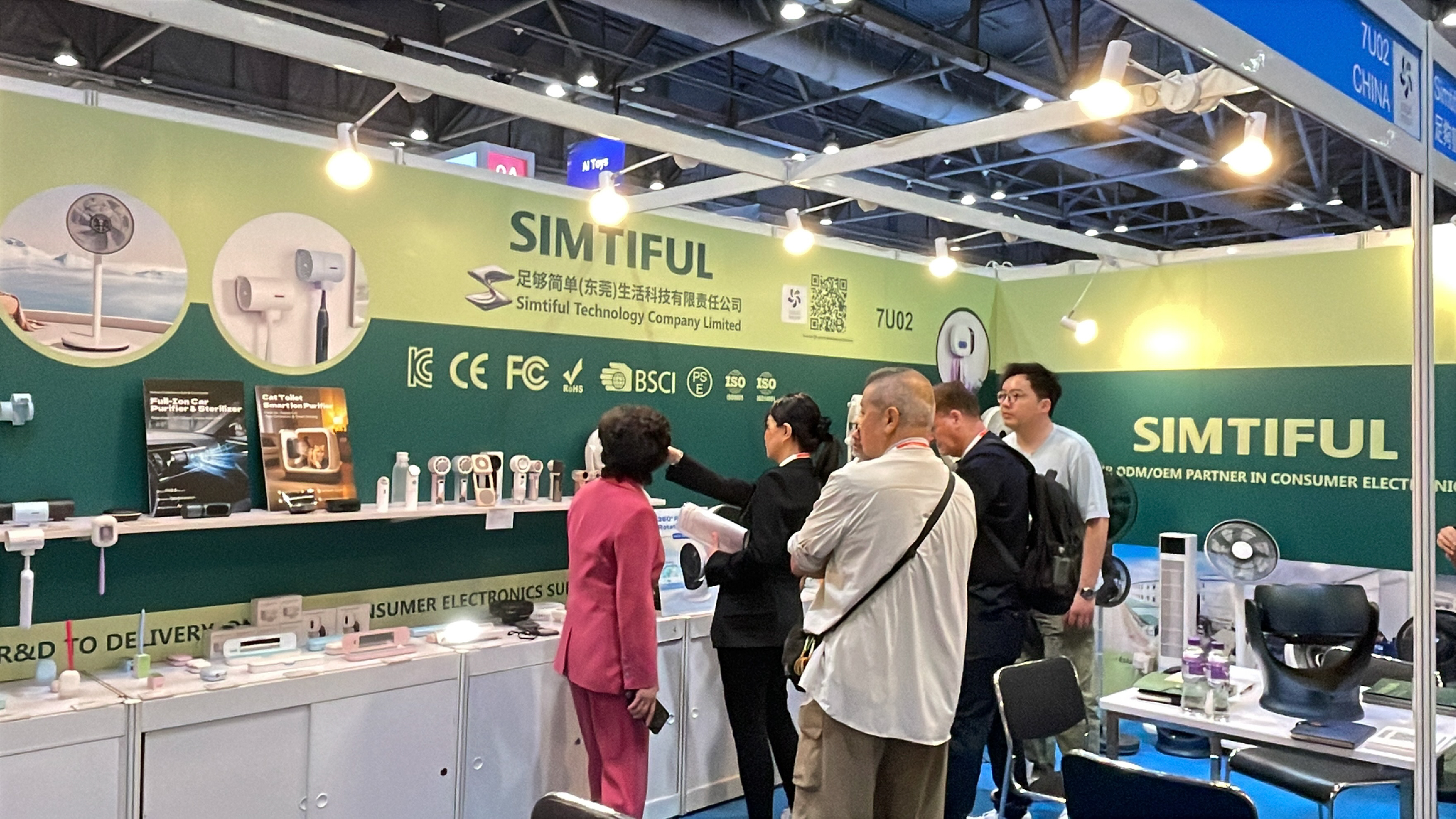 Visitors at the SIMTIFUL exhibition stand